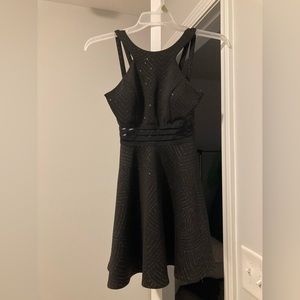 Adorable little black cocktail dress.